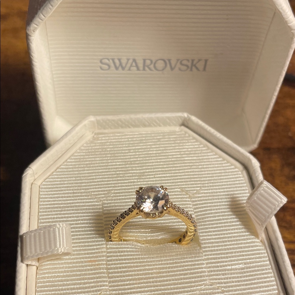 Swarovski Gold-Tone Ring with Sparkling Crystal - Picture 6 of 8
